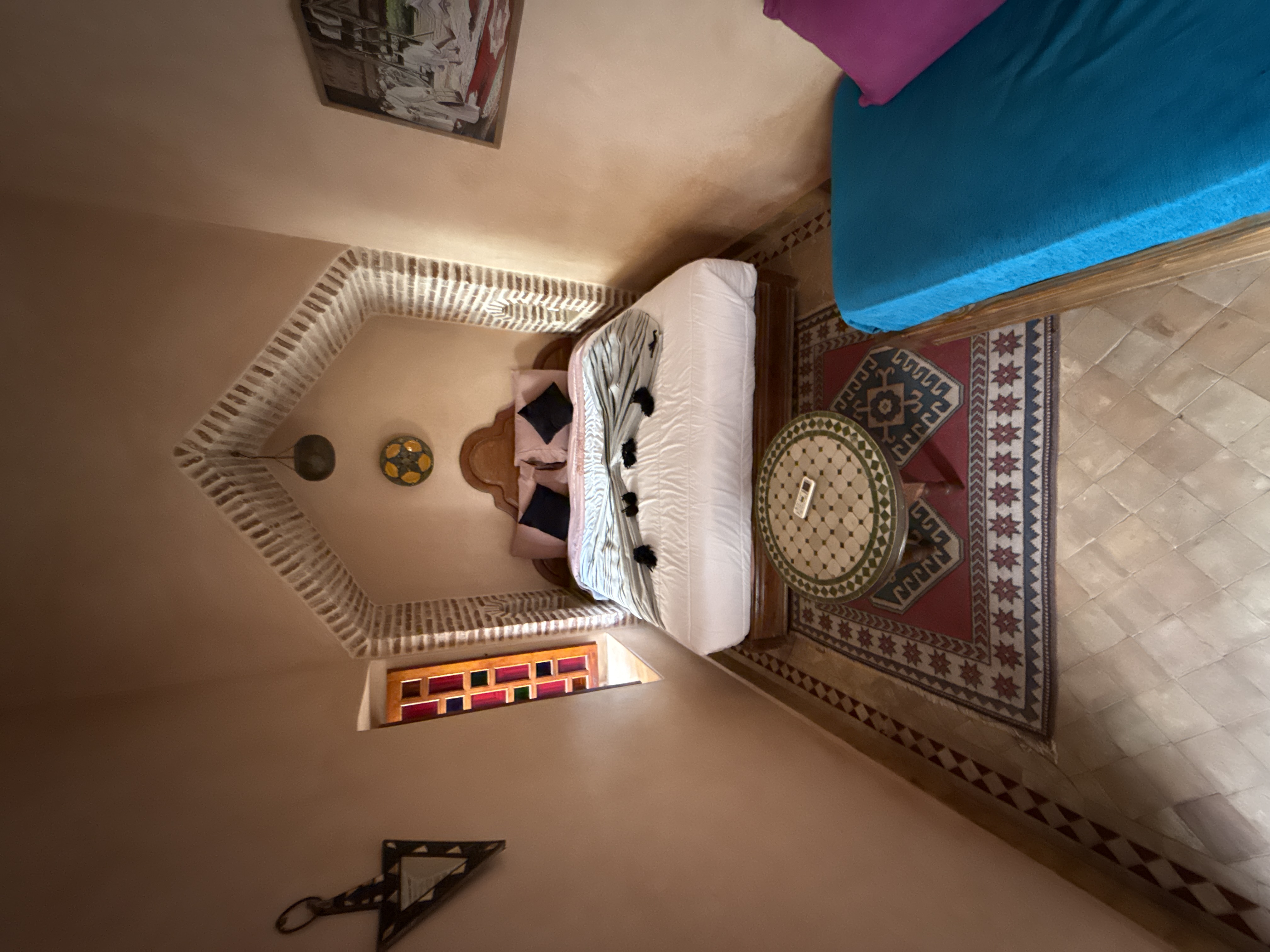 Traditional Moroccan riad room with arch